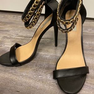 Black heeled sandal in women size 10
